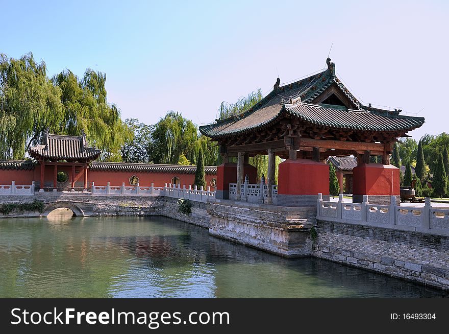 Beautiful and featured garden and pool in Chinese traditional temple, with historic architecture and trees. Beautiful and featured garden and pool in Chinese traditional temple, with historic architecture and trees.