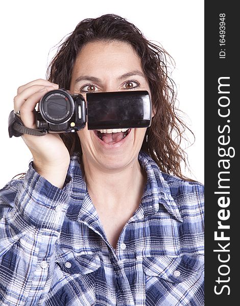 Woman watching video camera smile