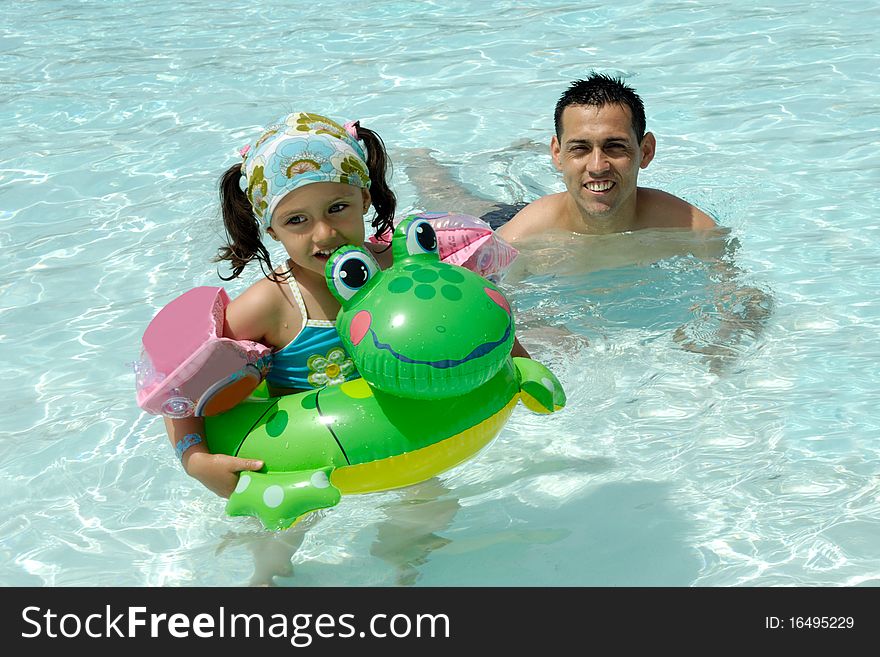 Man And Child In Pool