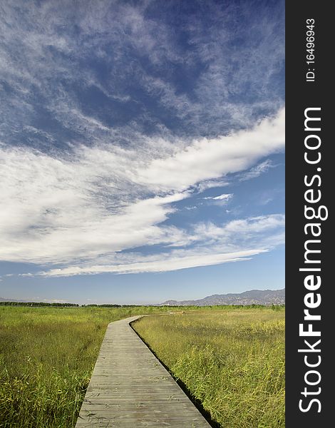 Blue sky,white cloud and winding road in china