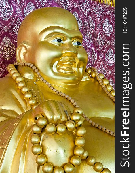 Smile buddha statue at Phichit province, Thailand.