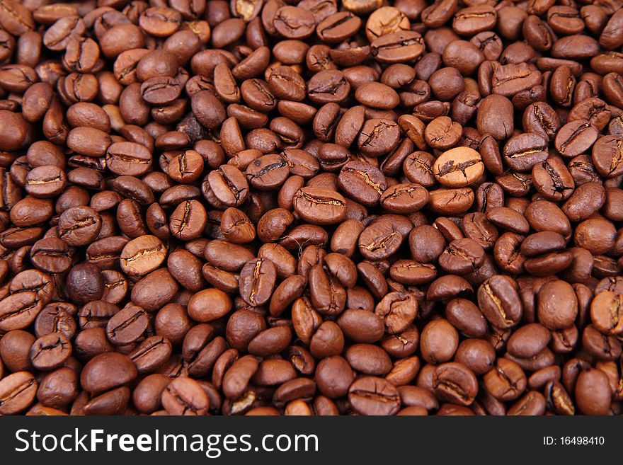 Coffee beans in close up - background