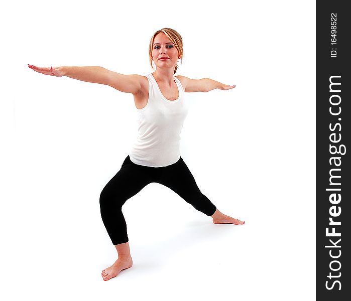 Beautiful girl practicing yoga on isolated white background