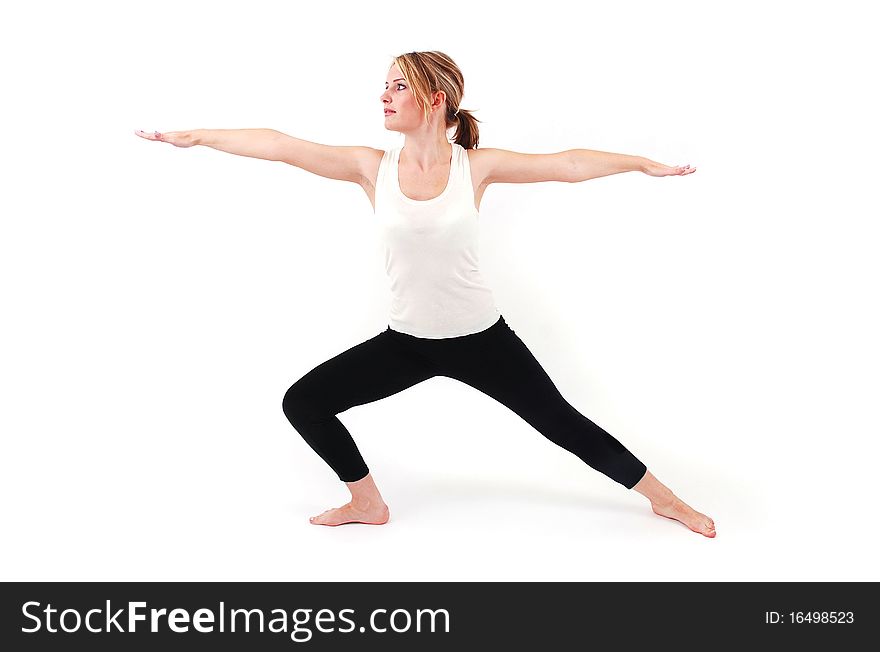 Beautiful girl practicing yoga on isolated white background