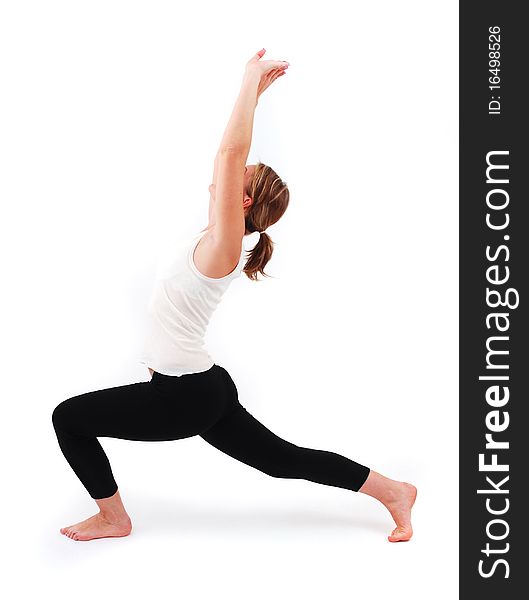 Beautiful girl practicing yoga on isolated white background