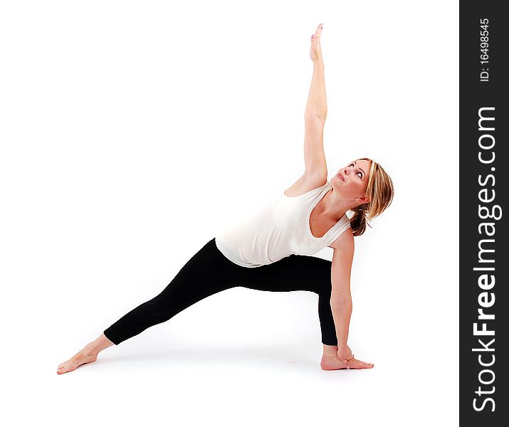 Beautiful girl practicing yoga on isolated white background