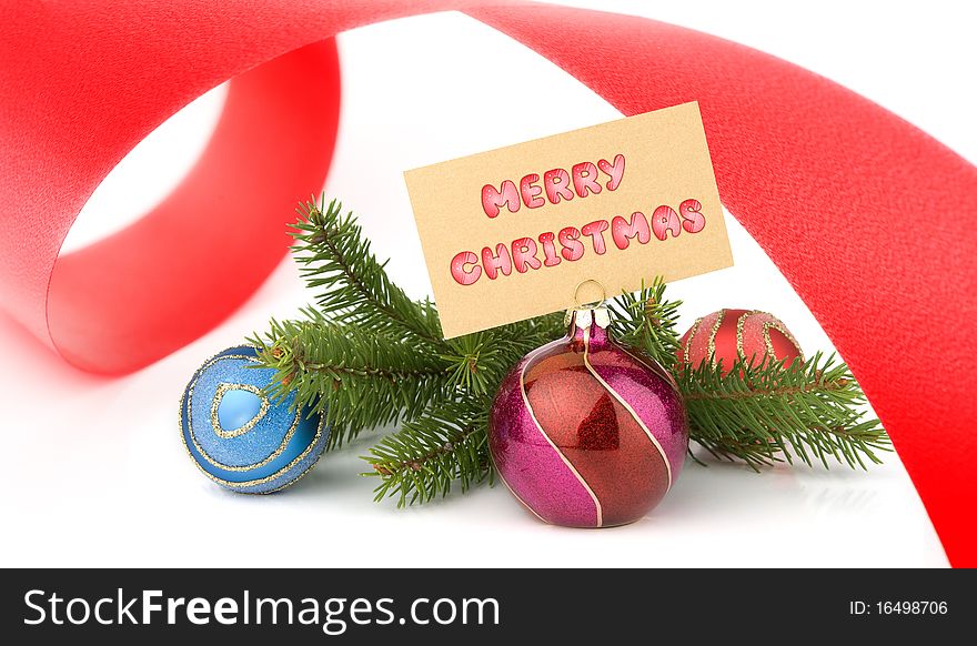 Christmas concept. Greeting card and Christmas ball and red ribbon