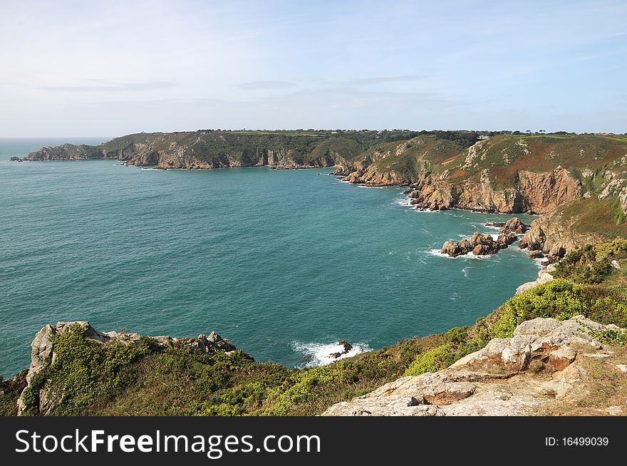 View to LeGouffre and cliffs at Petit Bot Bay from Icart Point on Guernsey