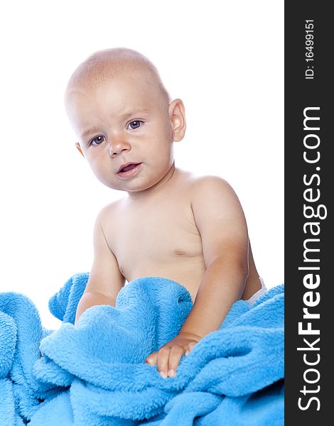 A beautiful baby with blue towel on white background