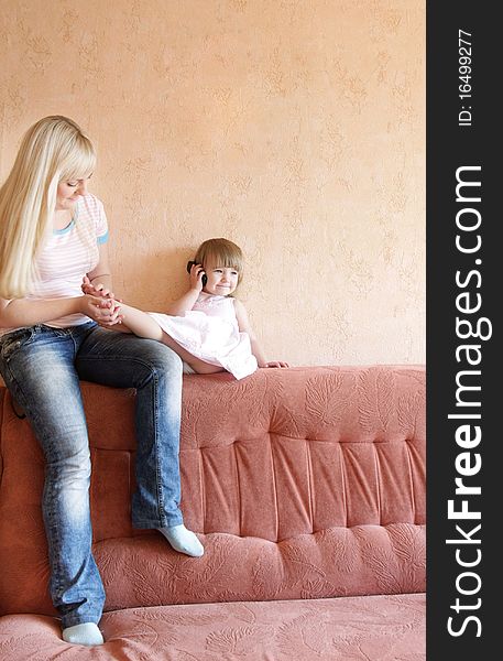 Loving mother and daughter at home