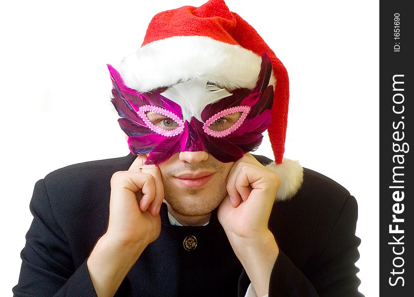 A man in mask and xmas hat on his head; over white background. A man in mask and xmas hat on his head; over white background