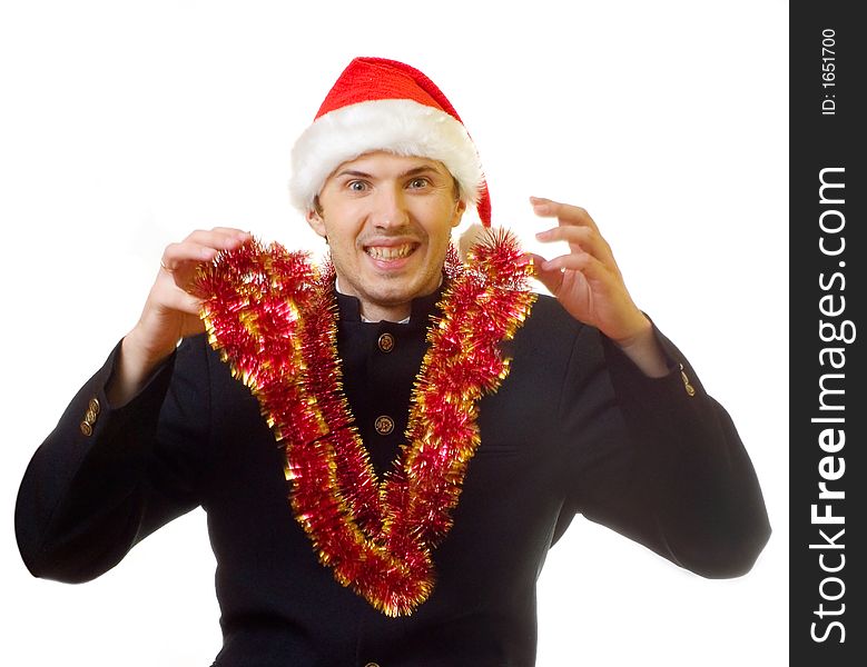 A man dressed in suit and xmas hat do something with tinsel; over white background. A man dressed in suit and xmas hat do something with tinsel; over white background