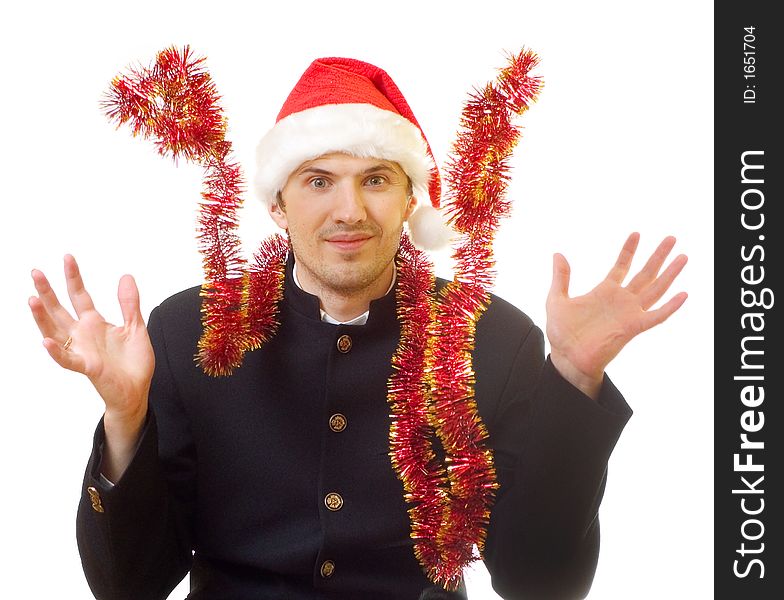 A man dressed in suit and xmas hat try to catch tinsel; over white background. A man dressed in suit and xmas hat try to catch tinsel; over white background