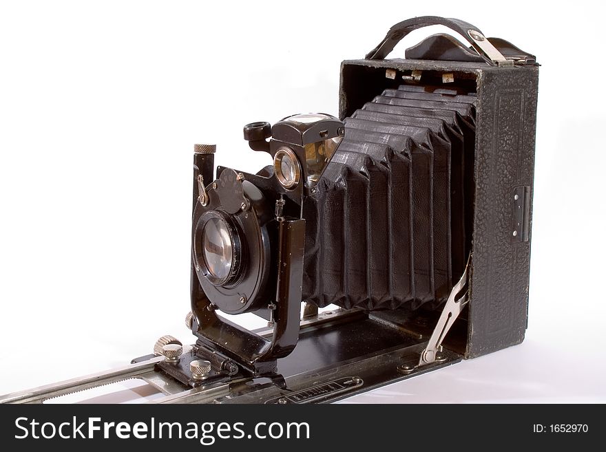 Old camera isolated on white background