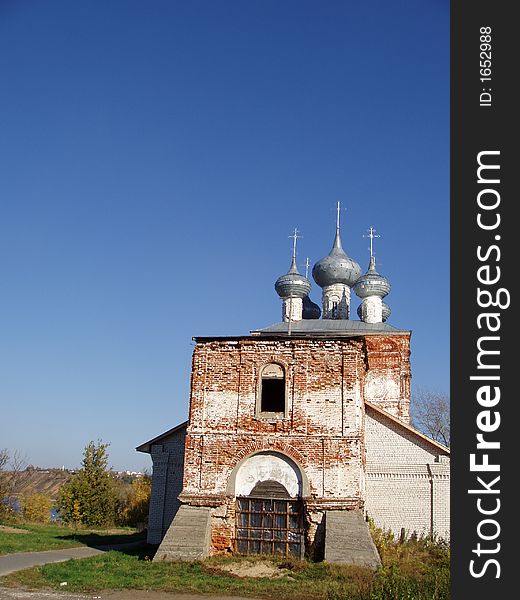 Church in russian village with sky and nature