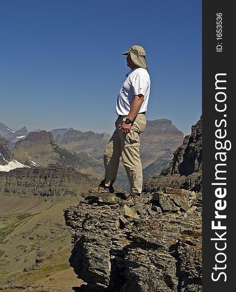 This image of the climber on the rock ledge was taken in western MT. This image of the climber on the rock ledge was taken in western MT.