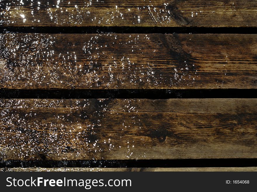 A brown pontoon and water