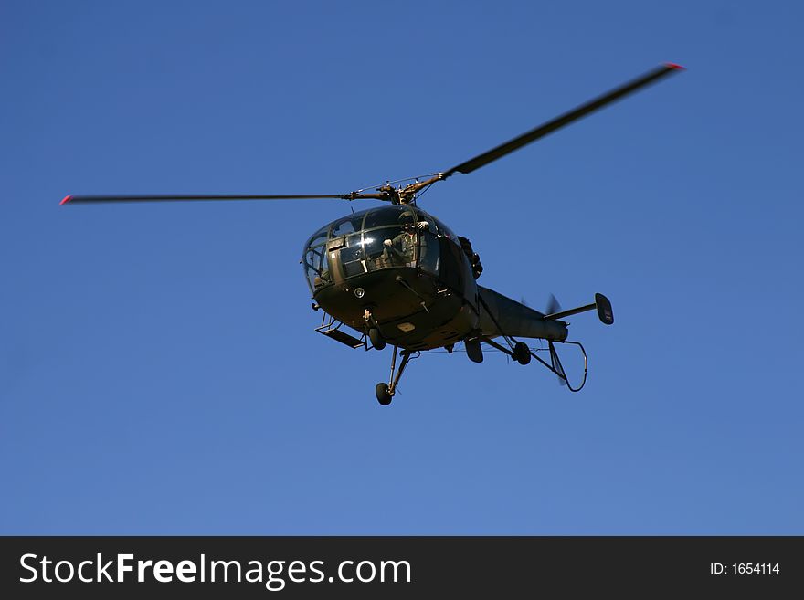 Oryx helicopter full frame on a clear day with bright blue background