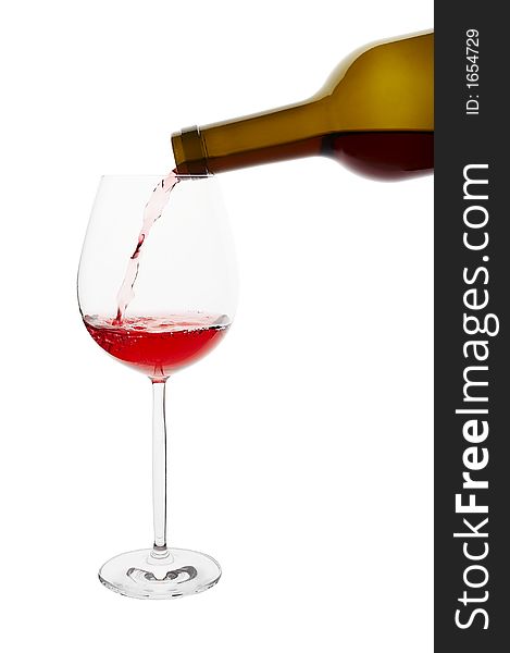 Pouring red wine to glass, clipping path included. Pouring red wine to glass, clipping path included.