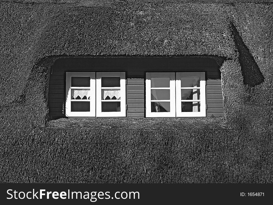 Picture shows windows and roof of a typical house on North Sea island of Germany, Amrum.