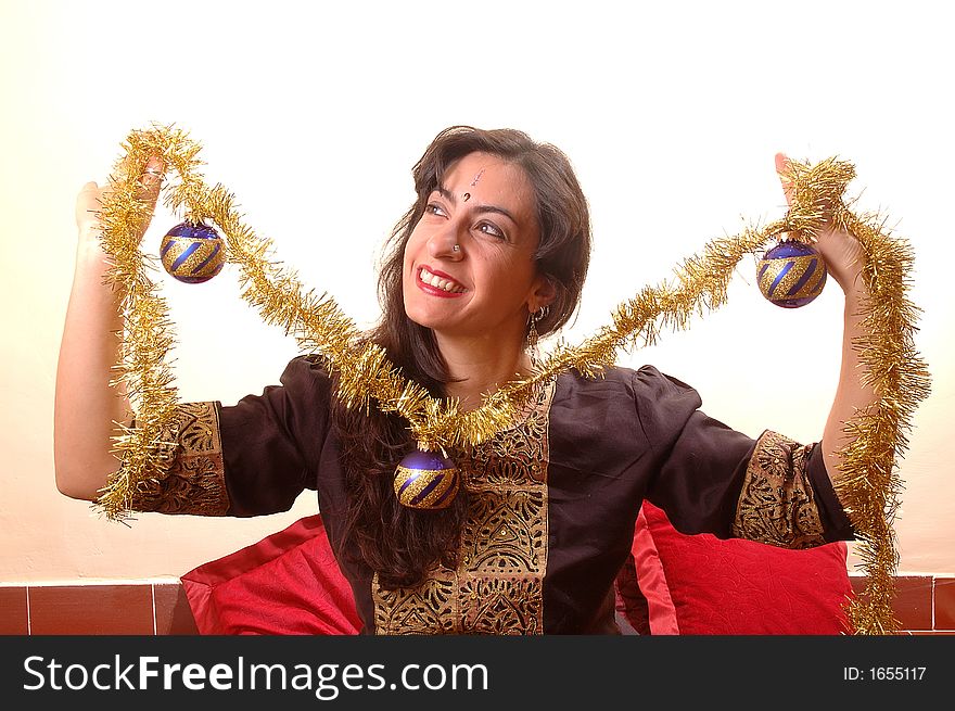 Woman preparing the christmas tree. Woman preparing the christmas tree