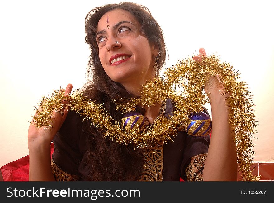 Woman preparing the christmas tree. Woman preparing the christmas tree