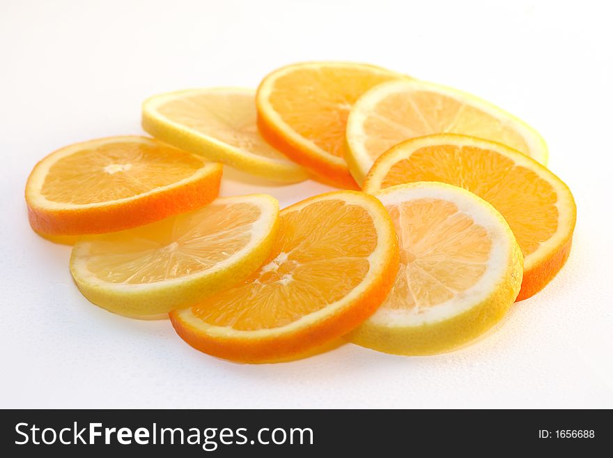 Some lemons and some oranges. Some lemons and some oranges