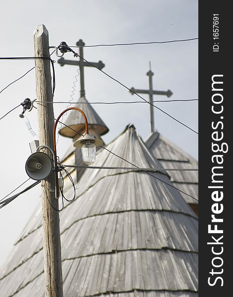 Mast, megaphone, light and crosses. Mast, megaphone, light and crosses