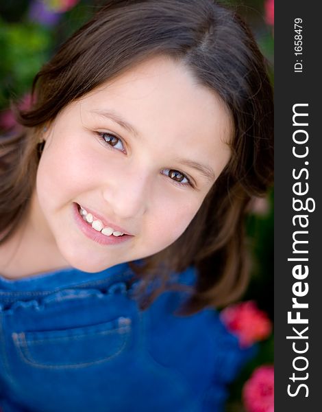 Little girl with brown long hair, being happy and smiling. Little girl with brown long hair, being happy and smiling