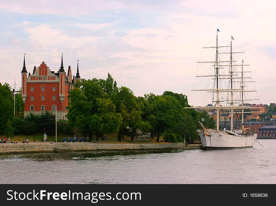 A ship alongside a castle, stockholm, sweden. A ship alongside a castle, stockholm, sweden