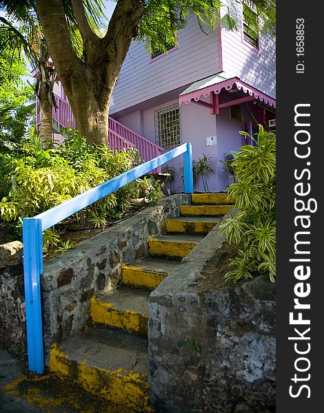Shot of a pink and blue staircase on the island of Saint Thomas. Shot of a pink and blue staircase on the island of Saint Thomas.