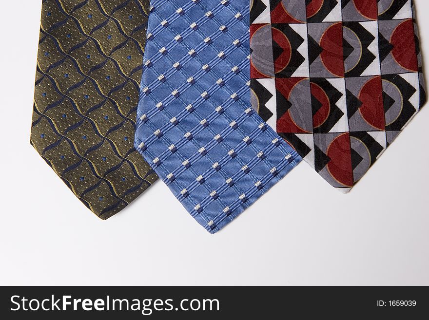 Set of ties over white