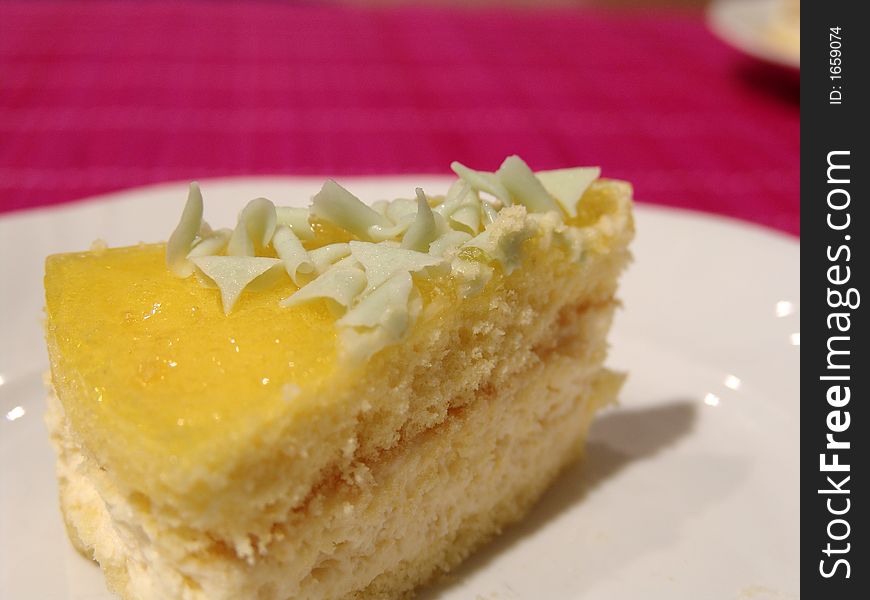 A slice of a lemon and chocolate cake. A slice of a lemon and chocolate cake.