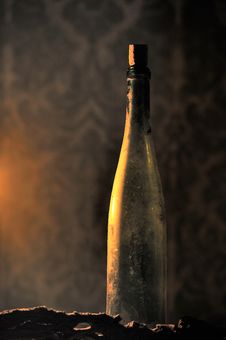 Candle Lighted Bottle Of Wine Stock Photos