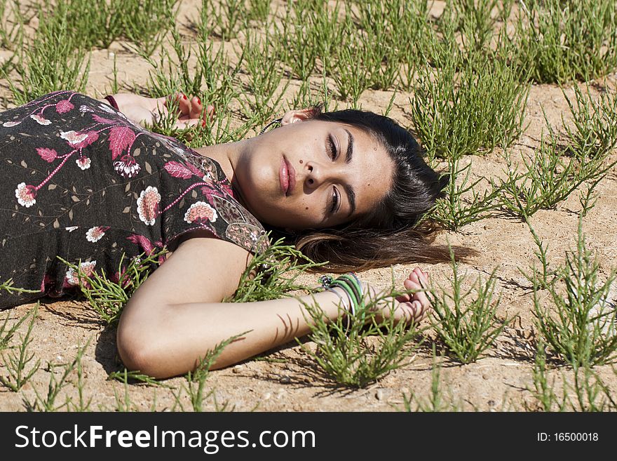 Girl sleeping on grass