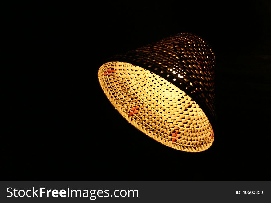 Braided lampshade in-door shot in the dark