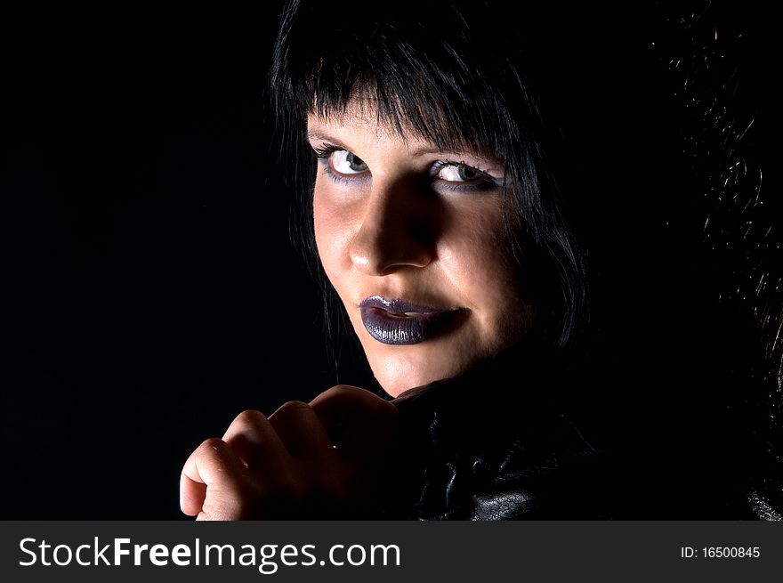 Portrait of smiling gothic woman with black hair. Portrait of smiling gothic woman with black hair