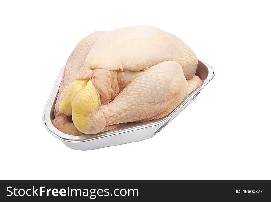 Raw Chicken ready for cooking in a metal tray, on a white background