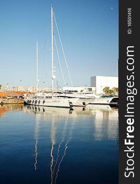 A lot of yachts standing in port of Barcelona. A lot of yachts standing in port of Barcelona