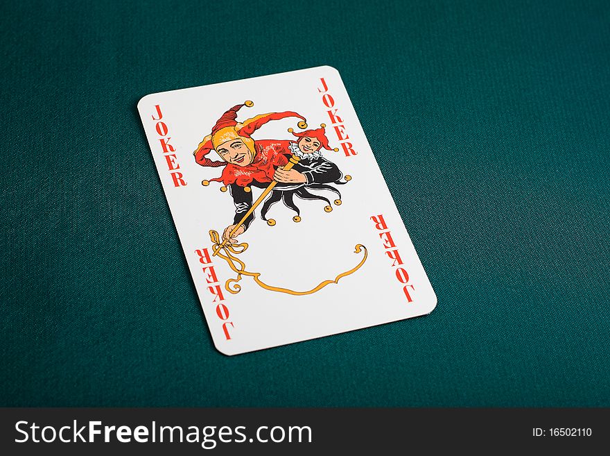 Joker playing card on white background