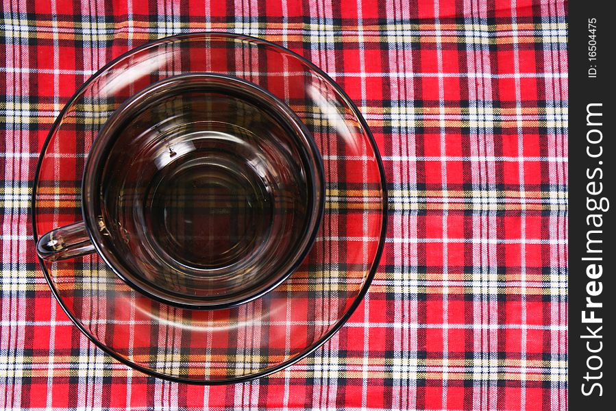 Empty glass tea cup isolated