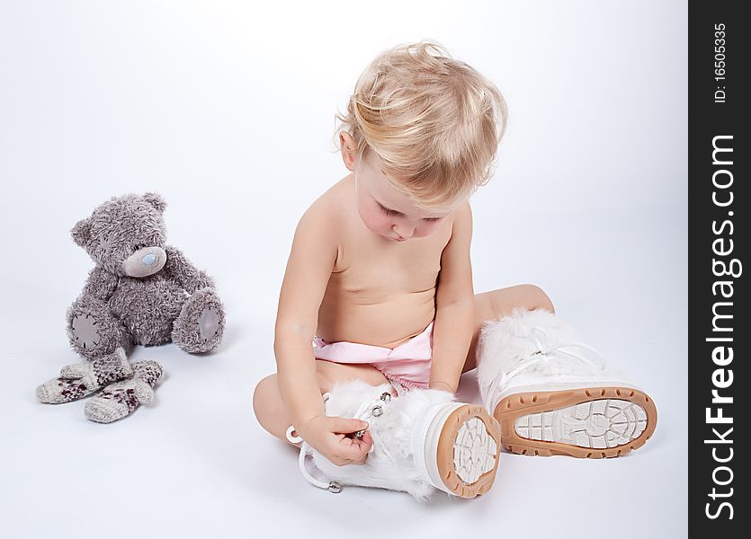 Beautiful child girl playing with toys and her mother. Beautiful child girl playing with toys and her mother