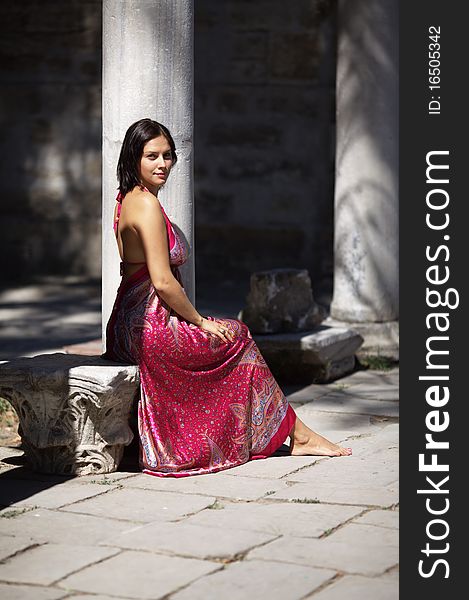 Young beautiful woman in Oriental dress. Young beautiful woman in Oriental dress