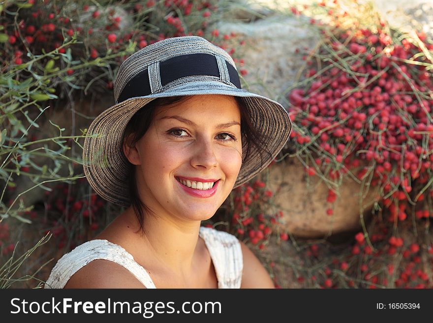 Young Beautiful Woman In A Hat