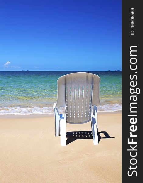 Plastic chair on tropical beach - Malaysia. Plastic chair on tropical beach - Malaysia