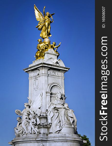 Nike (Goddess of Victory) Statue on the Victoria Monument Memorial outside Buckingham Palace, London. Nike (Goddess of Victory) Statue on the Victoria Monument Memorial outside Buckingham Palace, London