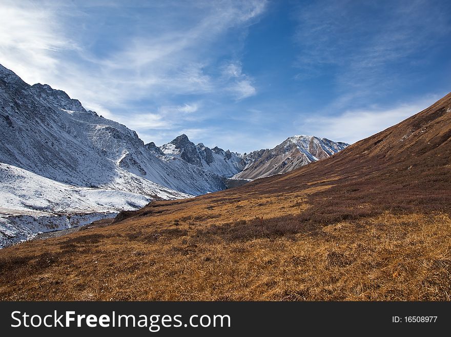 Mountain landscape with alpine grasslands. Sayan Mountains. Mountain landscape with alpine grasslands. Sayan Mountains