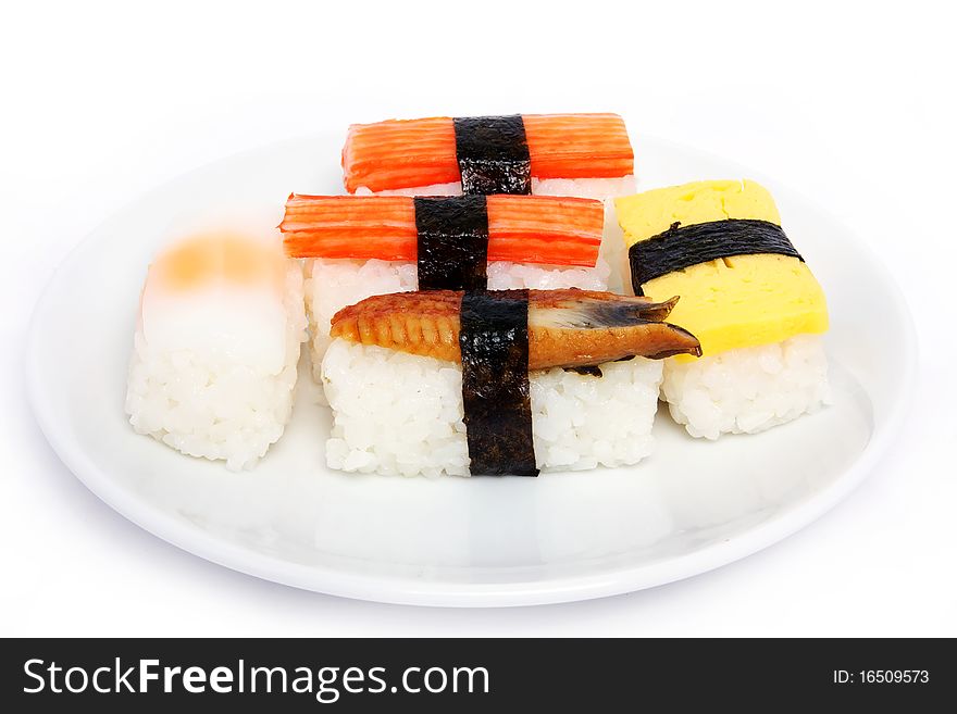 Various types of japanese sushi on plate. Various types of japanese sushi on plate