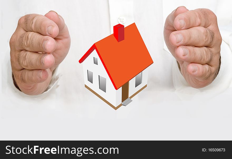 Close up of hands protecting house