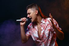 Singer With Silver Microphone On Black Background Stock Photography Singer With Silver Microphone On Black Background Stock Photography